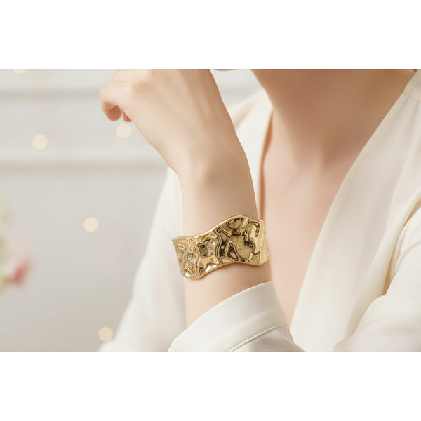 Sculpted Wave Stainless Steel Bracelet – Gold