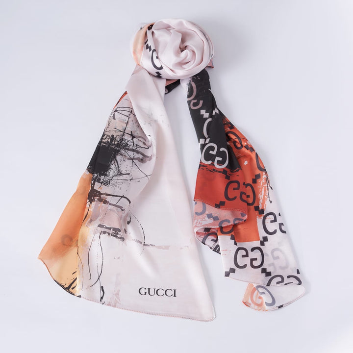 Gucci scarf with abstract design on a white background