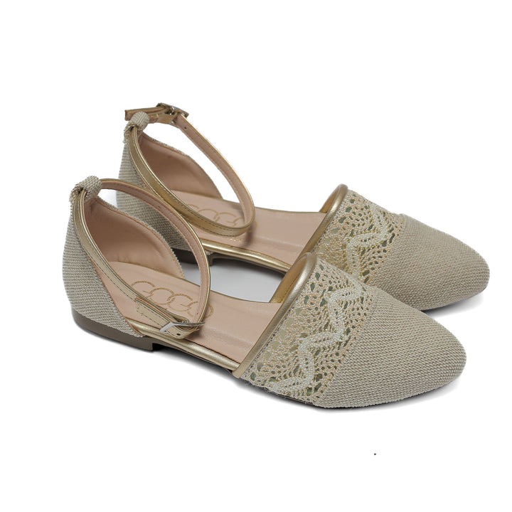 beige flat shoe with detailed lace and stitched toe