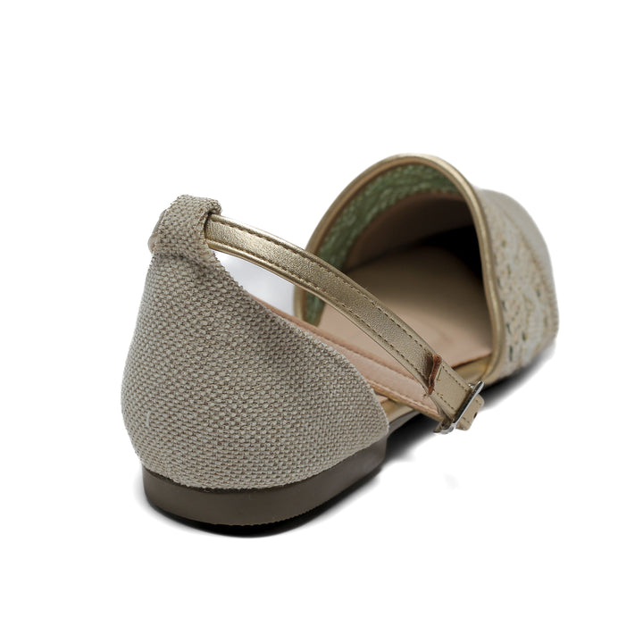 beige flat shoe with detailed lace and stitched toe