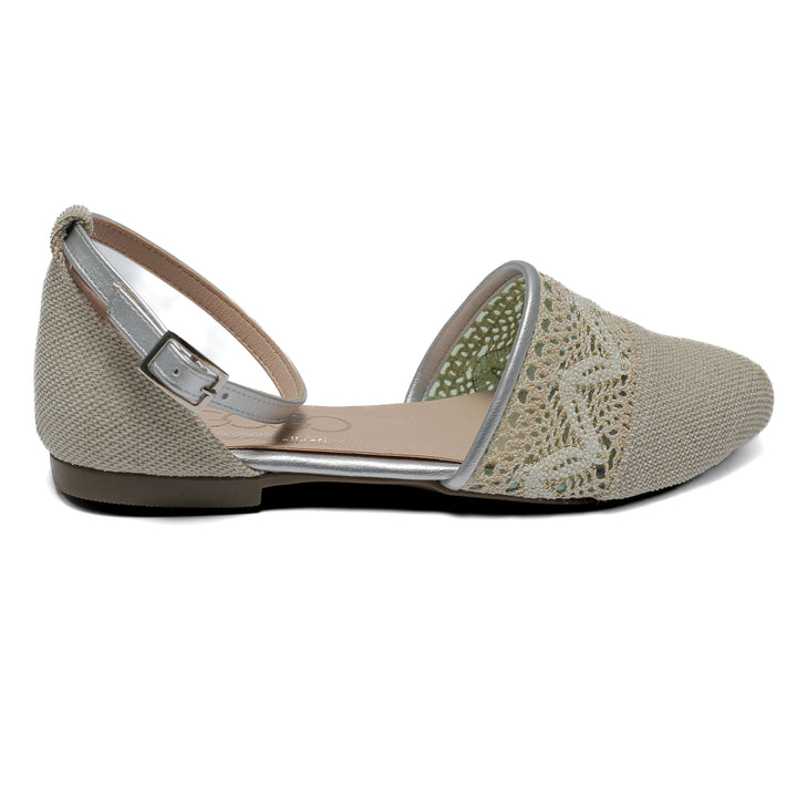 beige flat shoe with detailed lace and stitched toe