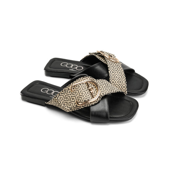 Black woven cross-strap sandals with a gold buckle
