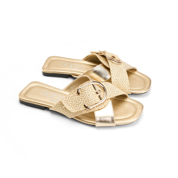 Gold woven cross-strap sandals with a gold buckle